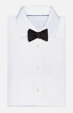 A Silk Evening Bow Tie by ETON is fastened to a crisp white dress shirt, displayed on a plain white background—elegant Italian formalwear ideal for special occasions.