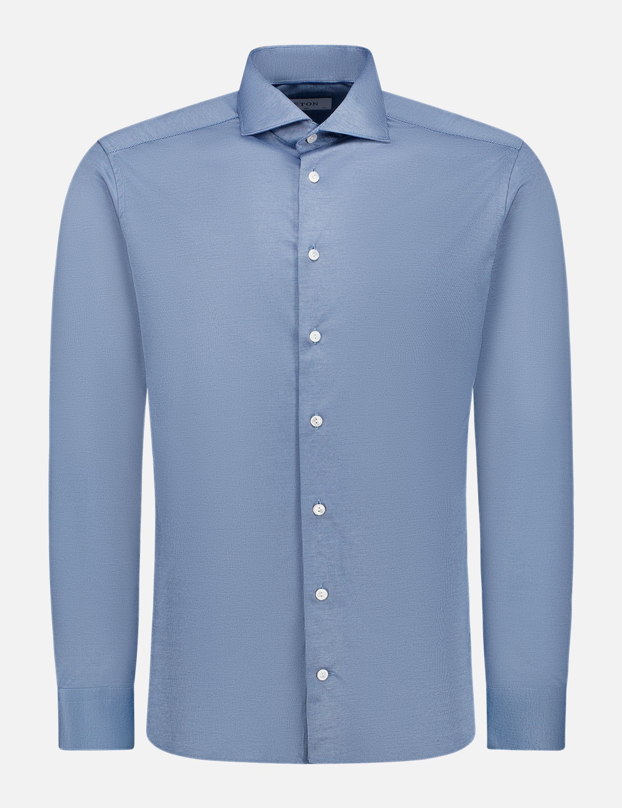 The ETON Mid Blue Filo Di Scozia Semi Solid Shirt features a long-sleeve, slim fit design with a collar, shown on a plain white background.