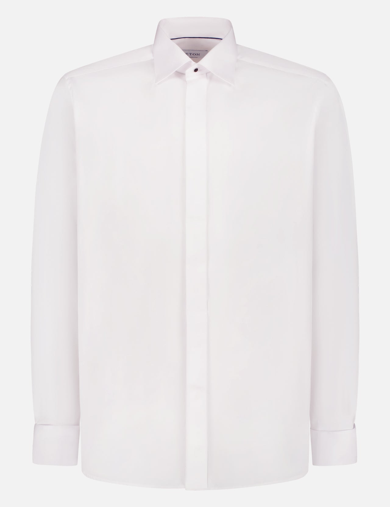 The ETON Solid Tux Shirt Slim Fit features a classic collar and hidden button-front placket, shown on a white background.