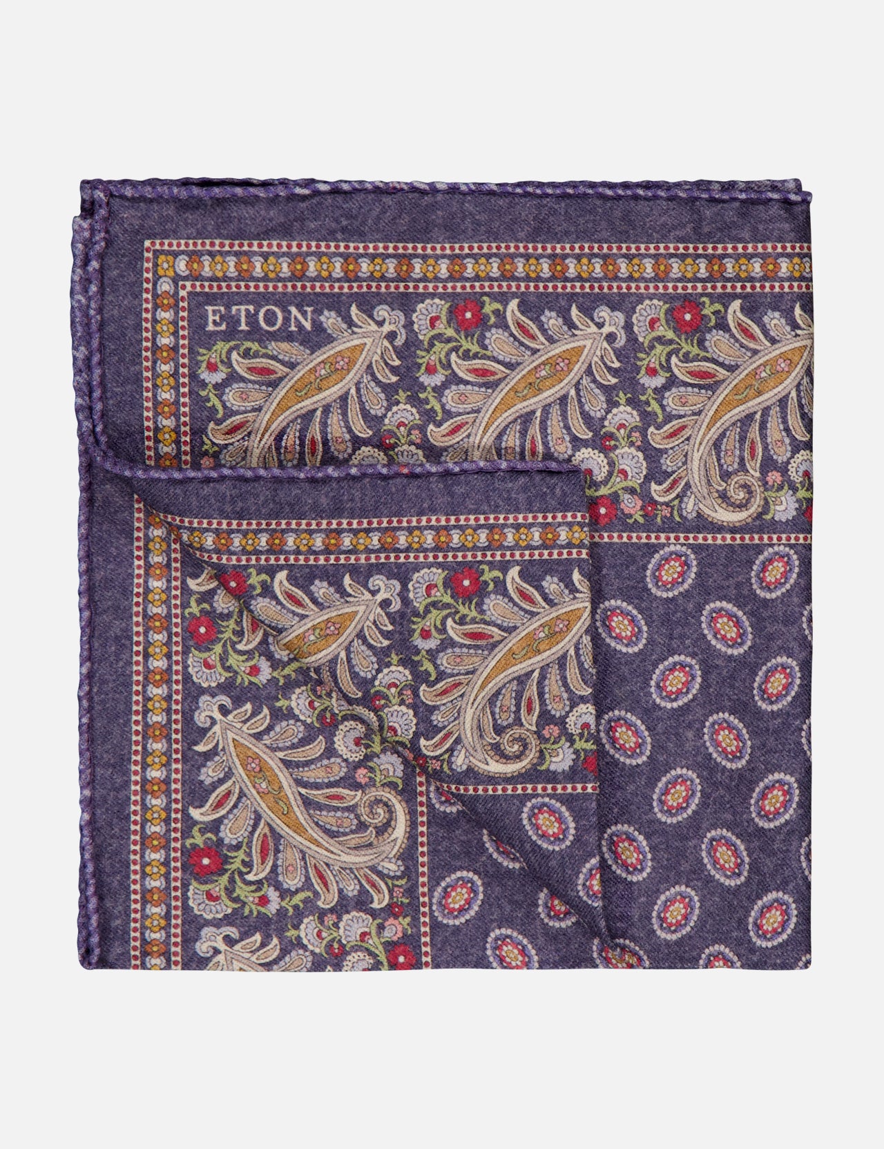 The Two-Face Wool Pocket Square by ETON is a folded purple accessory with an intricate paisley and dot pattern in yellow, red, and green, and features the ETON logo in the top left corner.
