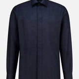 The ETRO Jacquard Long Sleeve Dress Shirt is a navy dress shirt made from soft cotton, showcasing a subtle geometric jacquard pattern and a classic collar, presented against a plain white background.