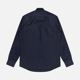 The Jacquard Long Sleeve Dress Shirt by ETRO is shown from the back in navy blue, featuring soft cotton construction, buttoned cuffs, a central pleat, and a subtle jacquard pattern for added texture.