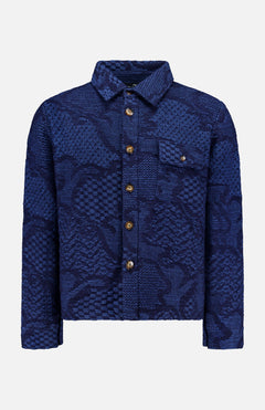 The ETRO Knitted Pattern Jacket is a navy wool jacket crafted in Italy, featuring a blue textured button-up design with a collar, chest pocket, and wooden buttons, displayed against a plain white background.