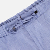 Close-up of the waistband on ETRO’s Linen Drawstring Trouser Pants, featuring a drawstring and elastic band. Made from lightweight, striped linen-blend fabric, these pants offer comfort and style for casual wear.