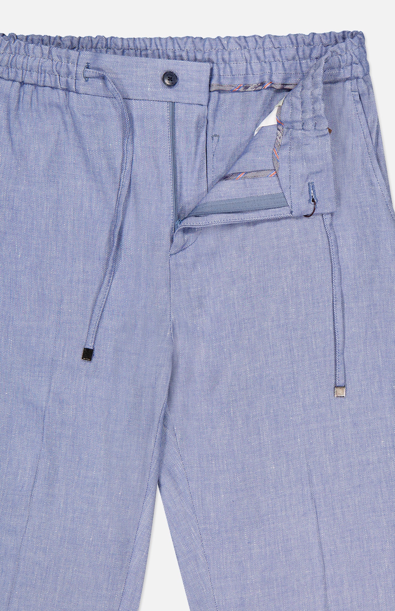 ETRO Linen Drawstring Trouser Pants in light blue feature a linen-blend fabric, elastic drawstring waist, button closure, and a partially open zipper fly with visible interior stitching detail.