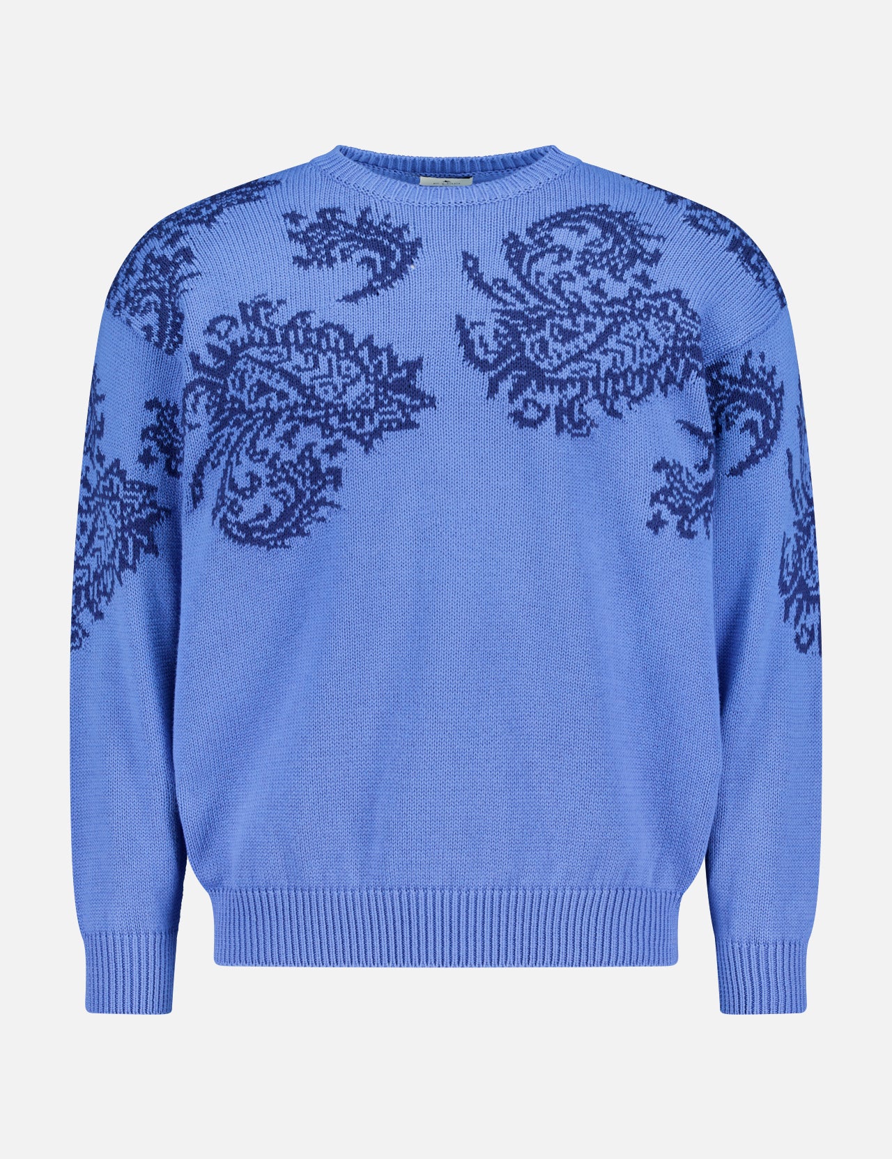 The ETRO Paisley Crewneck Sweater is a men's blue cotton pullover with long sleeves and a crew neckline, featuring dark blue paisley patterns on the chest and shoulders—perfect for spring.
