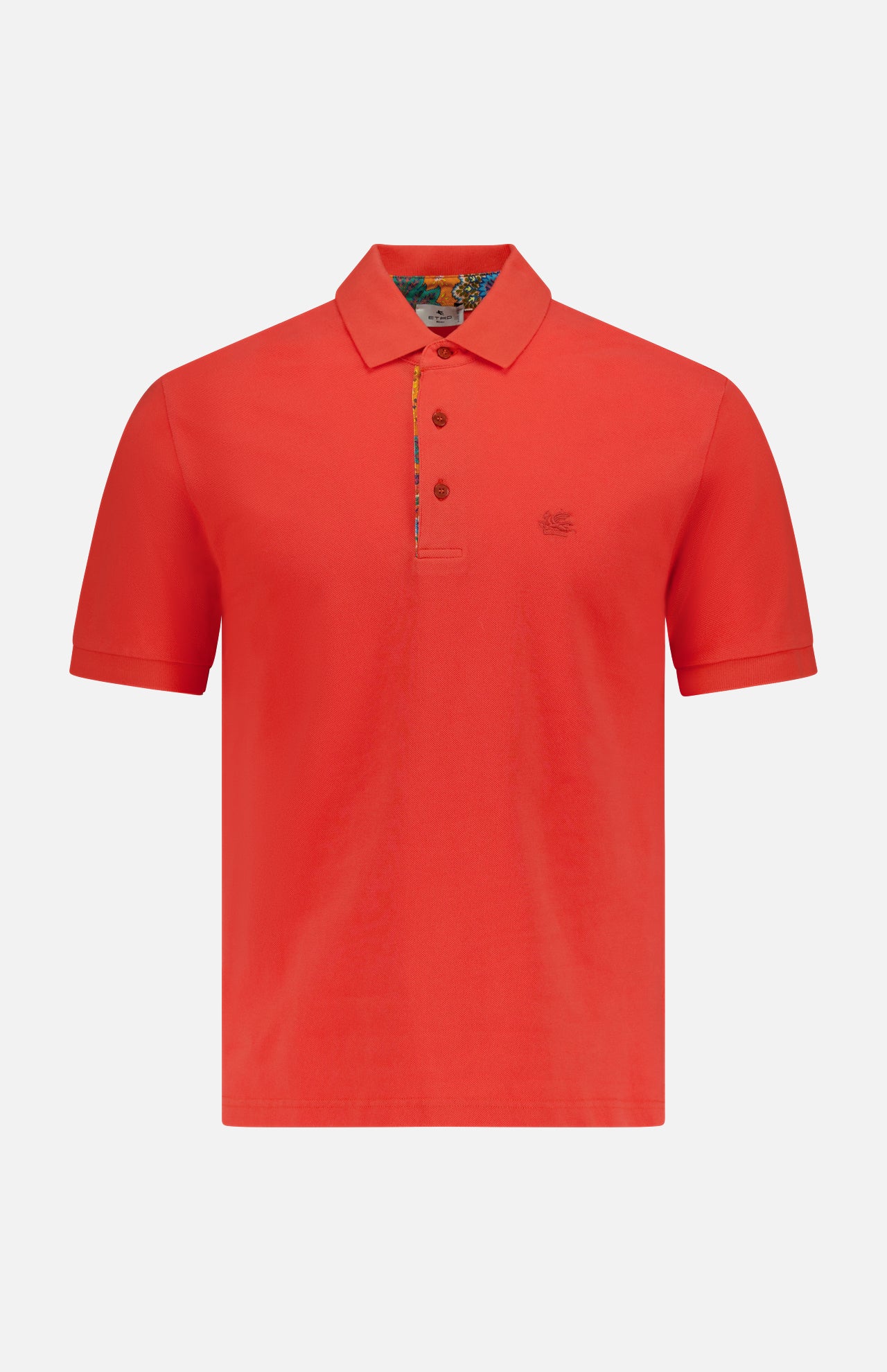 The ETRO Roma Printed Detail Polo Shirt features a bright tangerine hue, short sleeves, a collar, three buttons, and subtle logo embroidery on the left chest—an essential for men, shown on a plain white background.