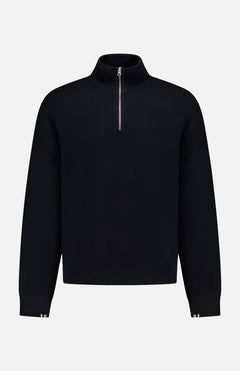 The EXTREME CASHMERE N°235 Hike 1/4 Zip Sweater, a black unisex pullover with a high collar, half-zip, and ribbed details, is displayed on a white background. Its drop-shoulder design brings modern style to classic comfort.
