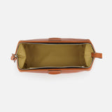 Top view of the F. HAMMANN The Mousetrap Flat Toiletry Bag, an open rectangular brown leather bag with a beige fabric interior and zipper, made in Germany, empty and displayed on a plain white background.