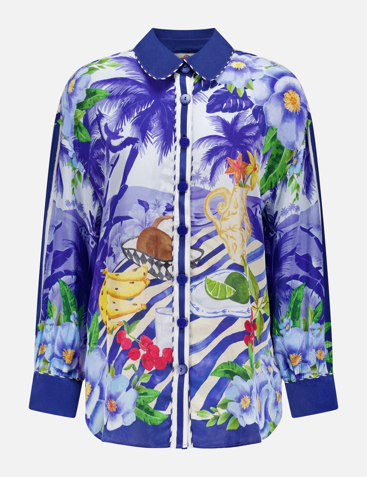 The FARM RIO Fruit and Floral Pajama Shirt is a vibrant, long-sleeve top with a blue floral and palm tree print, featuring banana, lime, coconut, and drink motifs plus blue cuffs and collar for standout style.