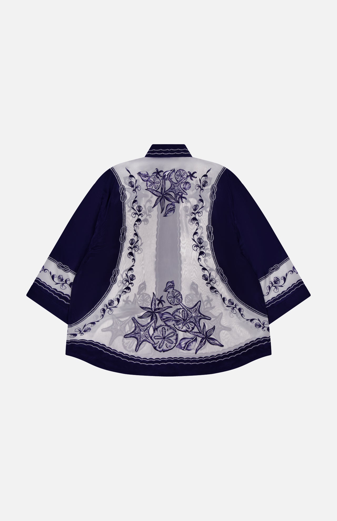 The Coast Scarf Wide Sleeve Shirt by FARM RIO is a navy blue long-sleeve top with a light lavender back panel, dark blue floral and vine embroidery, plus embroidered cuffs and hem—perfect for a stylish vacation look.