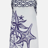 The Coast Stars Linen Mini Dress by FARM RIO is a white sleeveless mini dress with thin shoulder ties, navy embroidered starfish and seashells, plus a wavy hem—ideal as an embroidered summer dress.