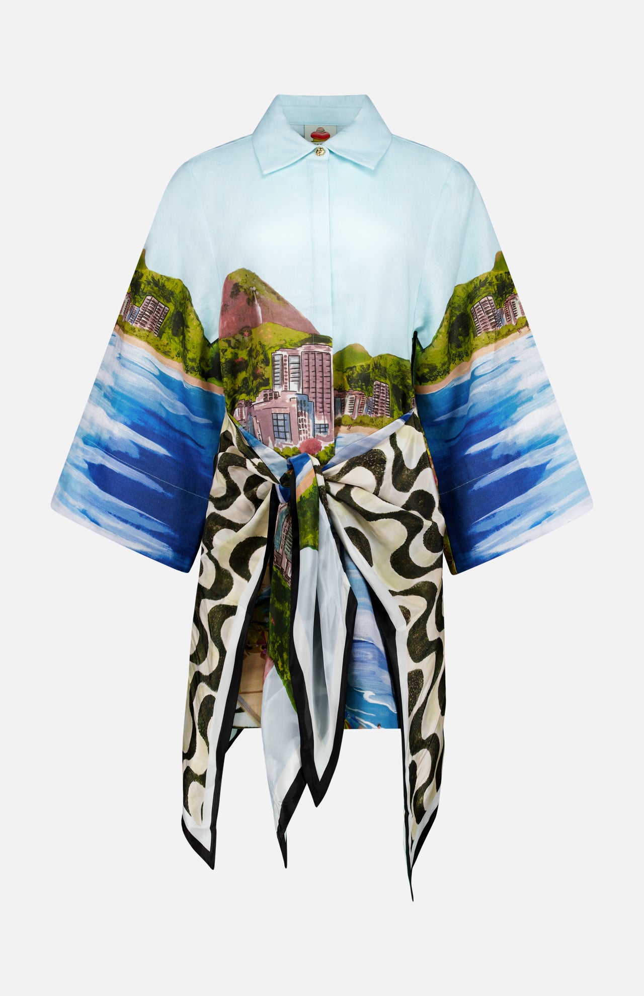 The Copacabana Beach Long Sleeve Kimono by FARM RIO showcases a vibrant coastal landscape with mountains, buildings, and sea, featuring wide sleeves and a colorful waist-tied scarf for added flair.