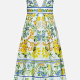 The FARM RIO Emily Floral Tapestry Midi Dress is a sleeveless, V-neck summer dress with a fitted bodice, flared skirt, vibrant yellow, green and blue florals on white, decorative borders and blue trim—perfect for bohemian style on warm days.