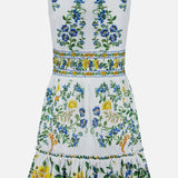 The Emily Floral Tapestry Mini Dress by FARM RIO is a sleeveless, white mini dress with a fitted waist and ruffled hem, adorned with blue, yellow, and green floral embroidery on organic cotton for a fresh, refined look.
