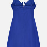 The Paper Boat Origami Bust Mini Dress by FARM RIO is a royal blue mini dress with spaghetti straps, a fitted bodice with petal-like origami details, and a flared A-line skirt—a modern summer party look for any occasion.