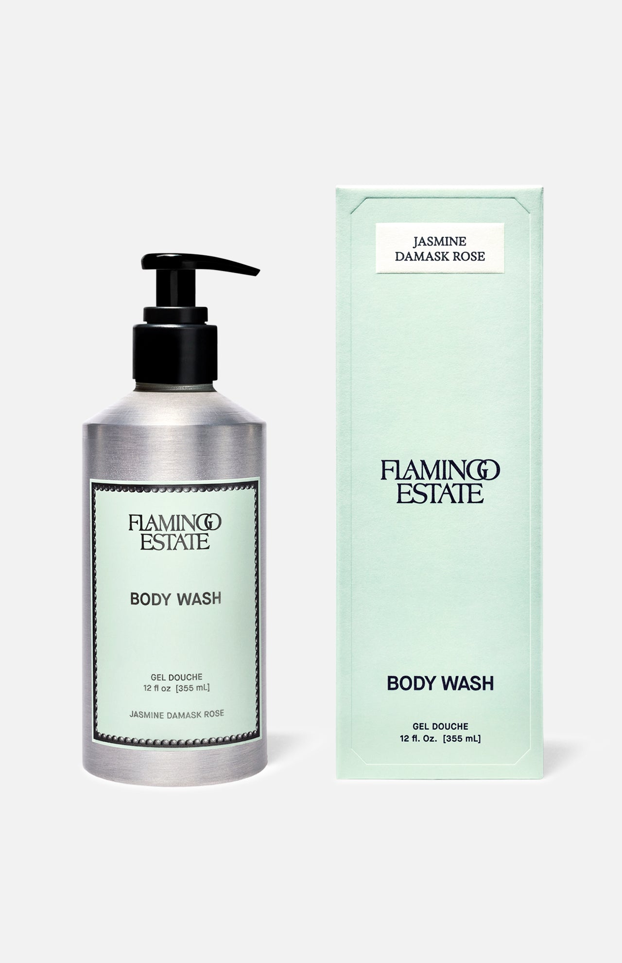 A silver pump bottle and mint green box of FLAMINGO ESTATE Jasmine Damask Rose Body Wash, enriched with natural sea salt, 12 fl oz (354 mL), with minimalist black-and-white labeling.