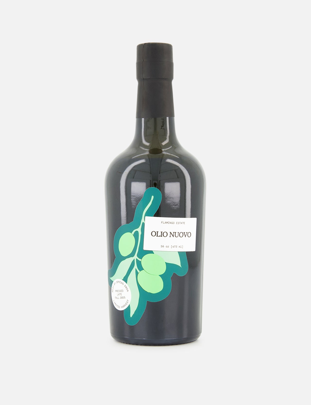 A 16 oz dark glass bottle of FLAMINGO ESTATE Olio Nuovo extra virgin olive oil with a black cap, featuring green olives on the label. This limited edition is crafted in Ojai, California.