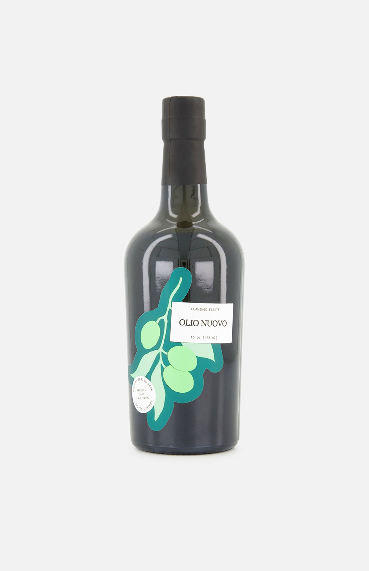 A 16 oz dark glass bottle of FLAMINGO ESTATE Olio Nuovo extra virgin olive oil with a black cap, featuring green olives on the label. This limited edition is crafted in Ojai, California.