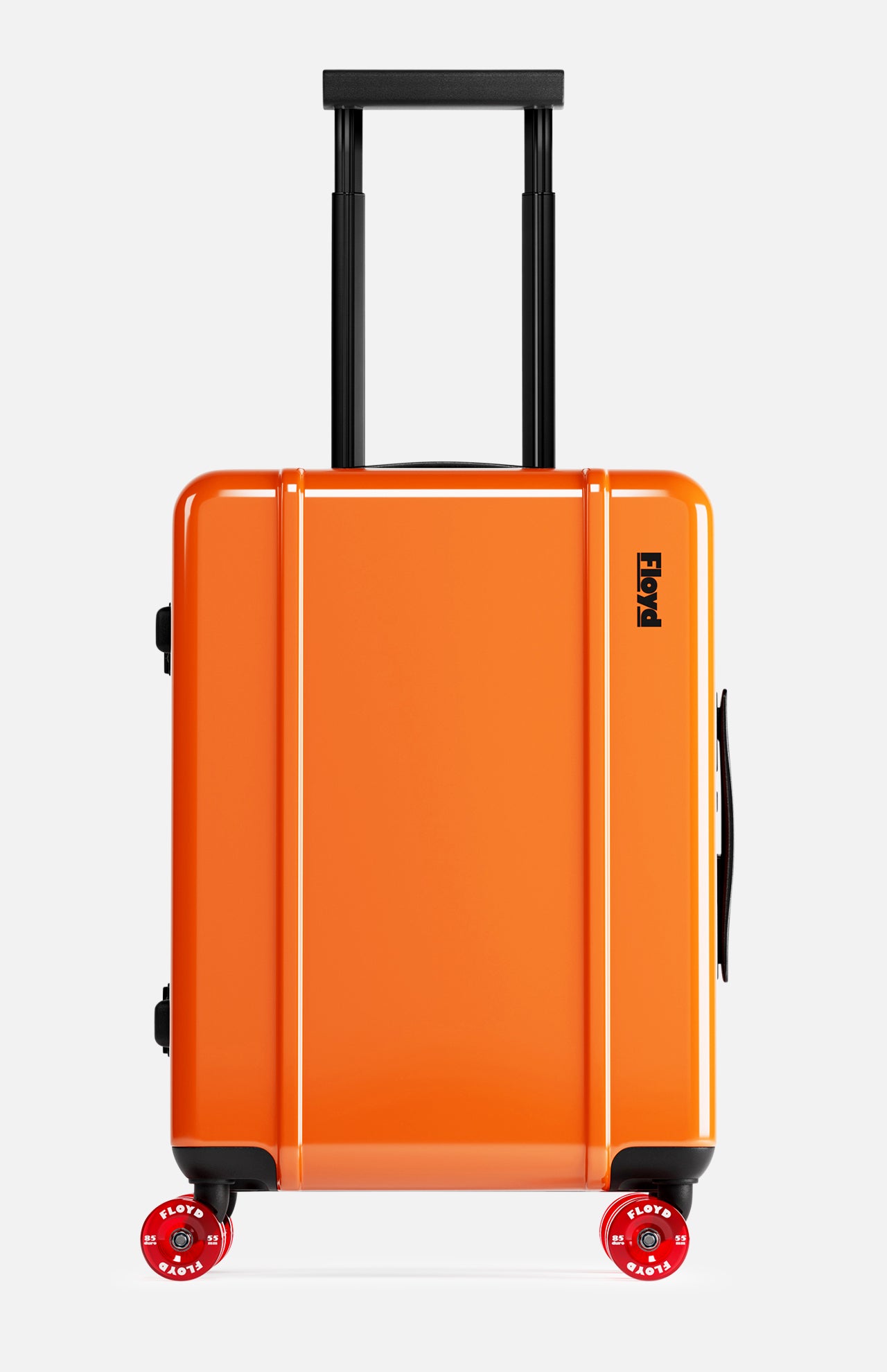 The Cabin Suitcase by FLOYD is a bright orange hard-top suitcase with a black telescopic handle and two red skateboard spinner wheels, shown standing upright against a plain white background.