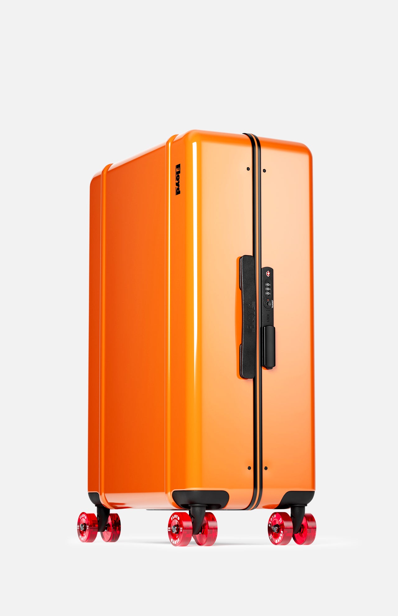 The FLOYD Check-In Suitcase, a vibrant orange hard-top case with black trim and TSA lock, stands upright on four red transparent skateboard spinner wheels against a plain white background.