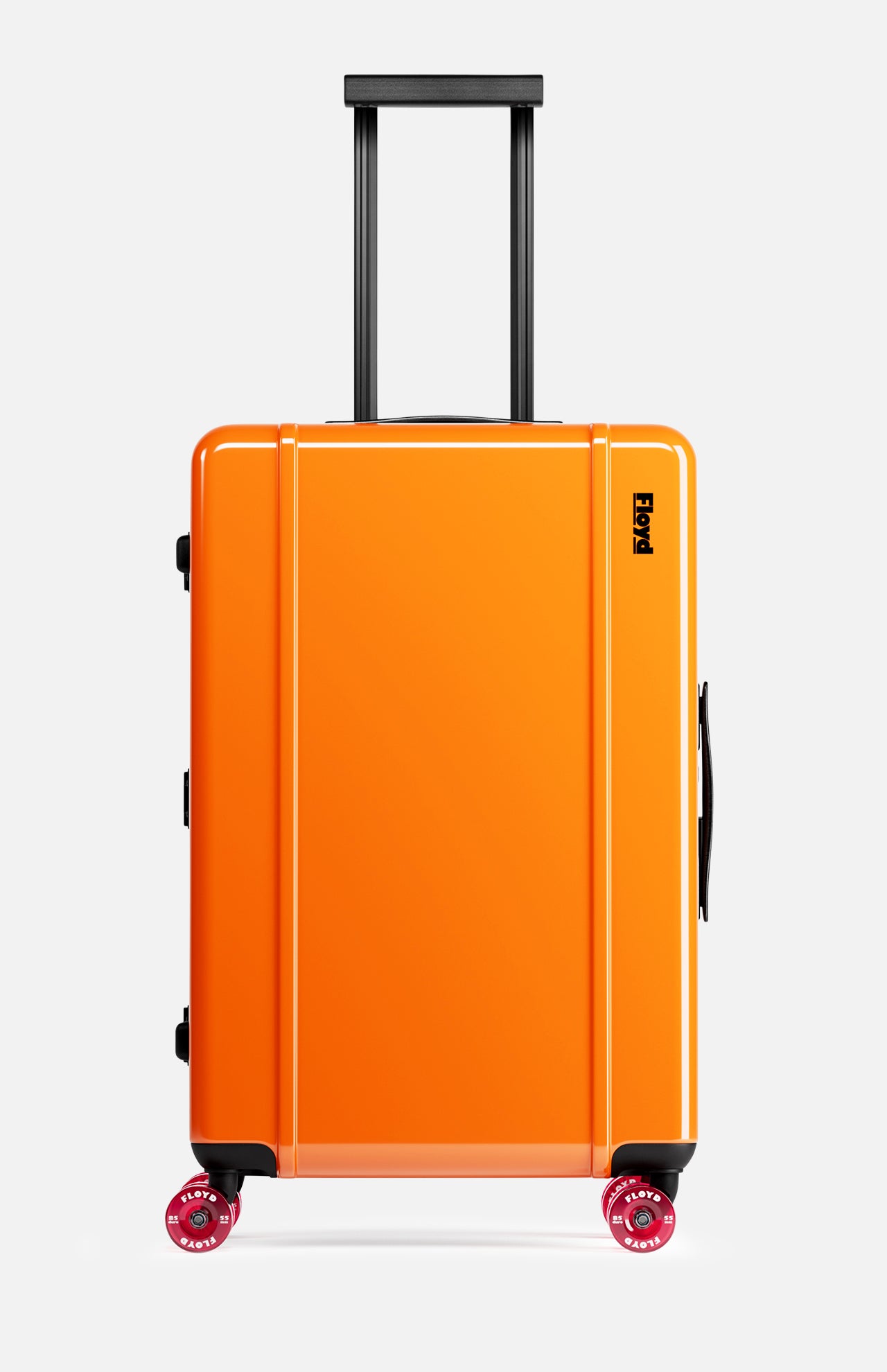The FLOYD Check-In Suitcase is an upright, hard-top orange luggage with four pink skateboard spinner wheels, a black side handle, and an extended telescopic handle, shown against a plain white background.