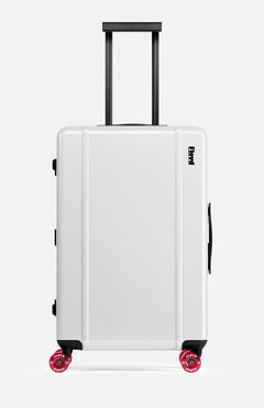 The Check-In Suitcase by FLOYD is a white hard-top with a black telescopic and side handle, distinctive red skateboard spinner wheels, and the FLOYD logo printed near the top right.