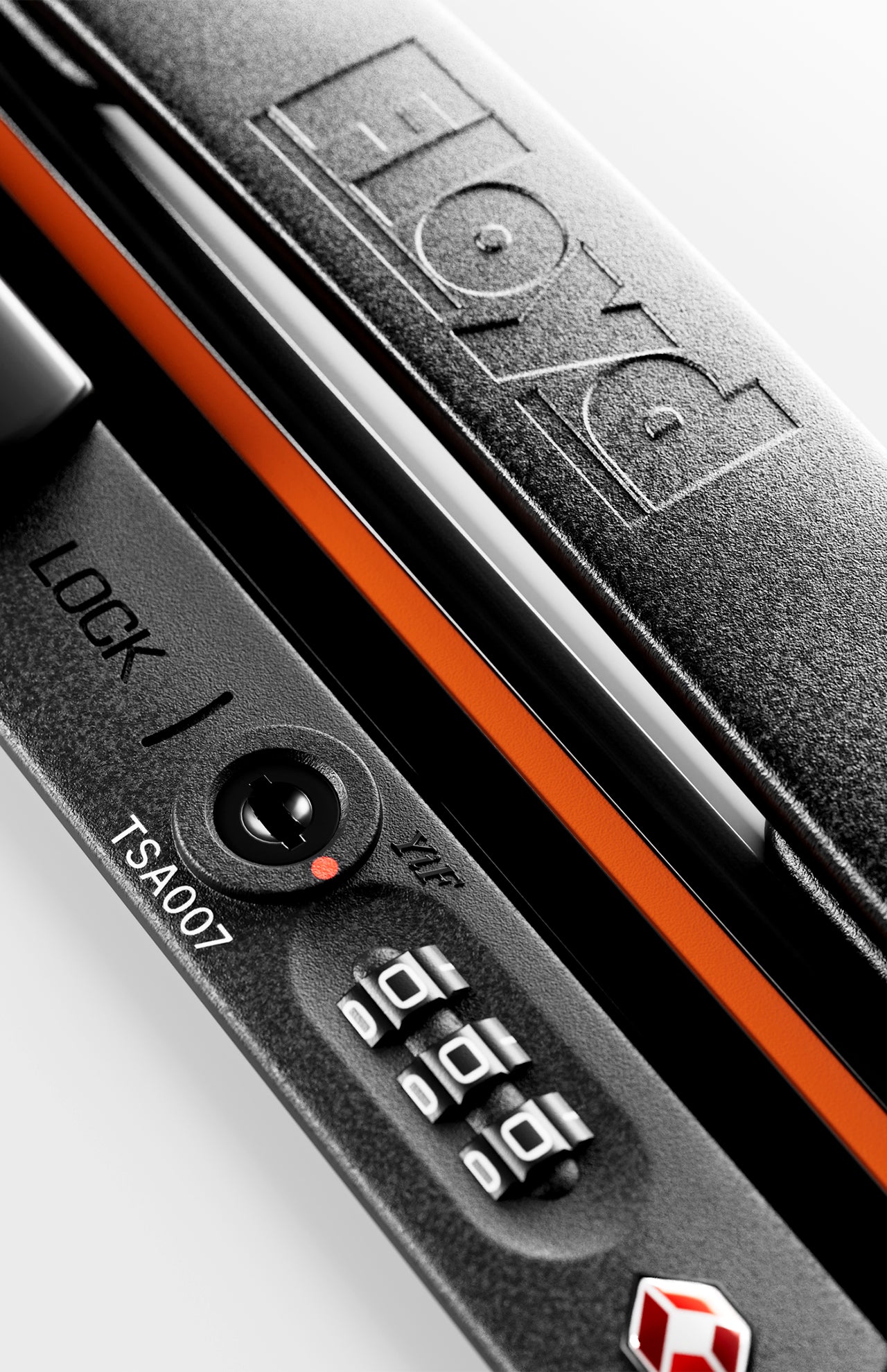 Close-up of the locking mechanism on FLOYD’s The Check-In Suitcase, showing a black TSA lock with combination dial, TSA007 keyhole, orange trim, and the FLOYD name embossed on the surface.