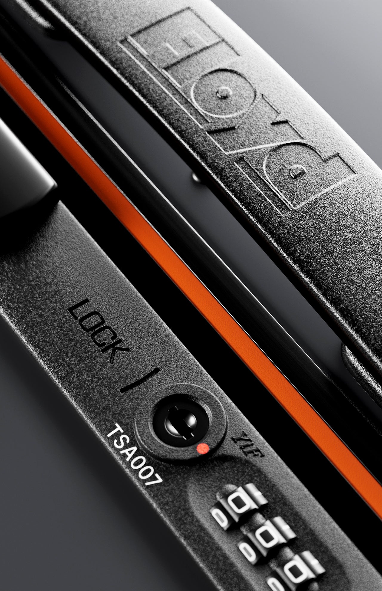 Close-up of a black TSA007 lock on The Trunk Suitcase by FLOYD, featuring the brand name embossed on the hard shell and an orange accent stripe.