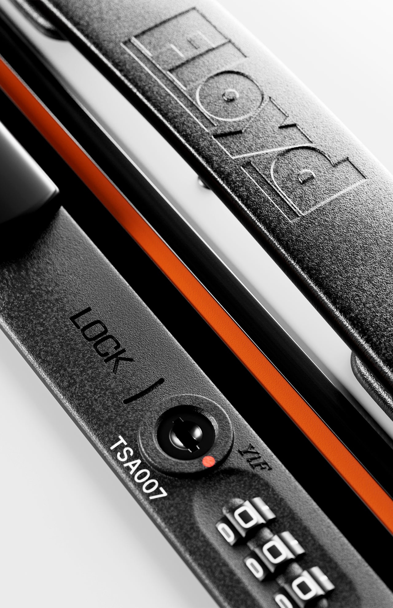 Close-up of a black lock with LOCK, a TSA007 keyhole, and part of a combination dial on the hard-top FLOYD The Trunk Suitcase; brand name is embossed on metal above orange trim.