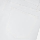 Close-up of the back pocket and waistband of the L’Homme Slim Pant in Whisper White by Frame, crafted from premium stretch denim and featuring detailed stitching.