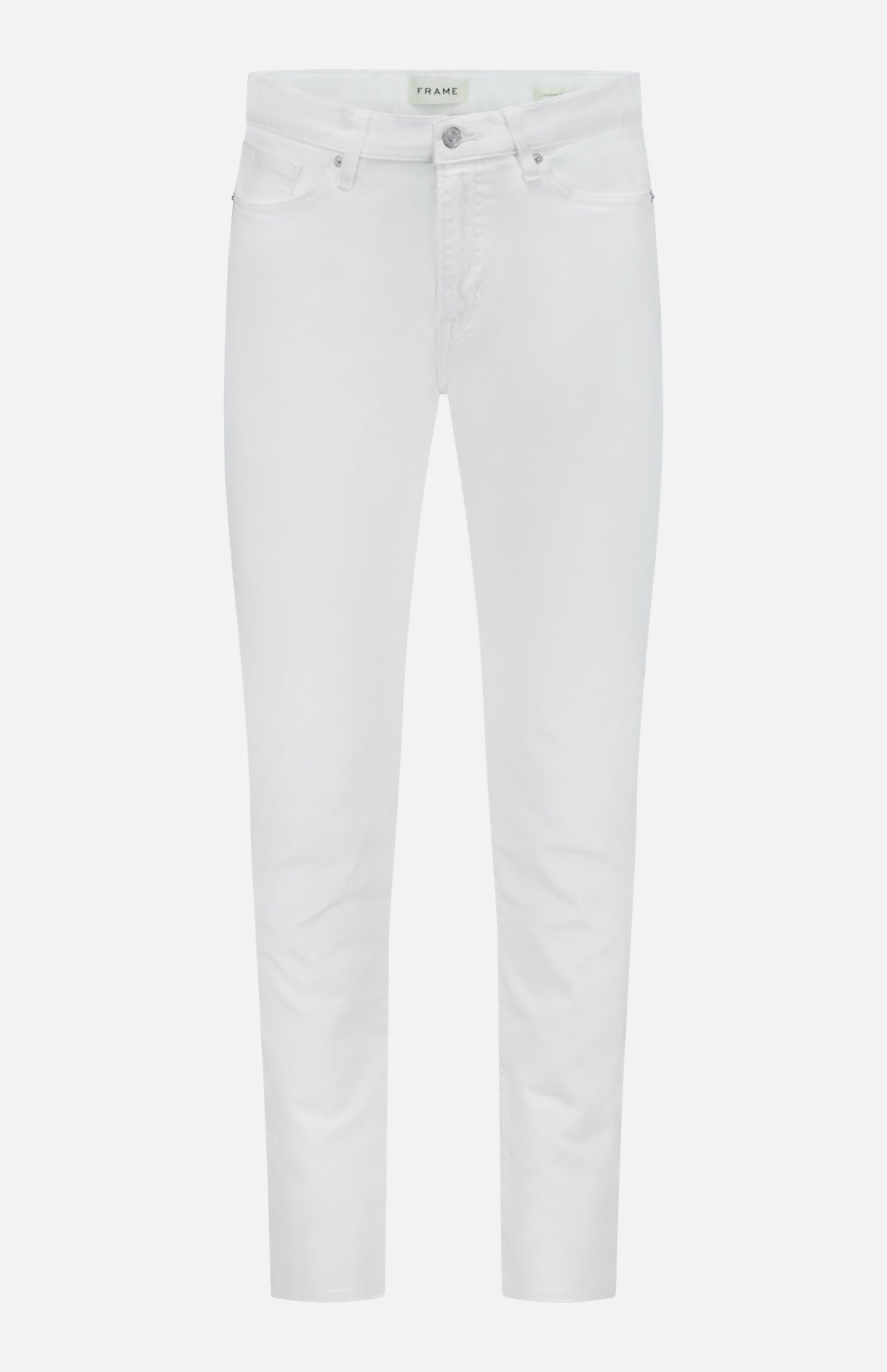 L’Homme Slim Pant in Whisper White by Frame, crafted from premium stretch denim, showcases a slim fit with five pockets, button and zipper closure, and belt loops—presented against a plain white background.