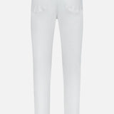 Back view of the Frame L’Homme Slim Pant in Whisper White, featuring two back pockets, straight legs, and belt loops at the waistband, crafted from premium stretch denim and displayed on a plain white background.