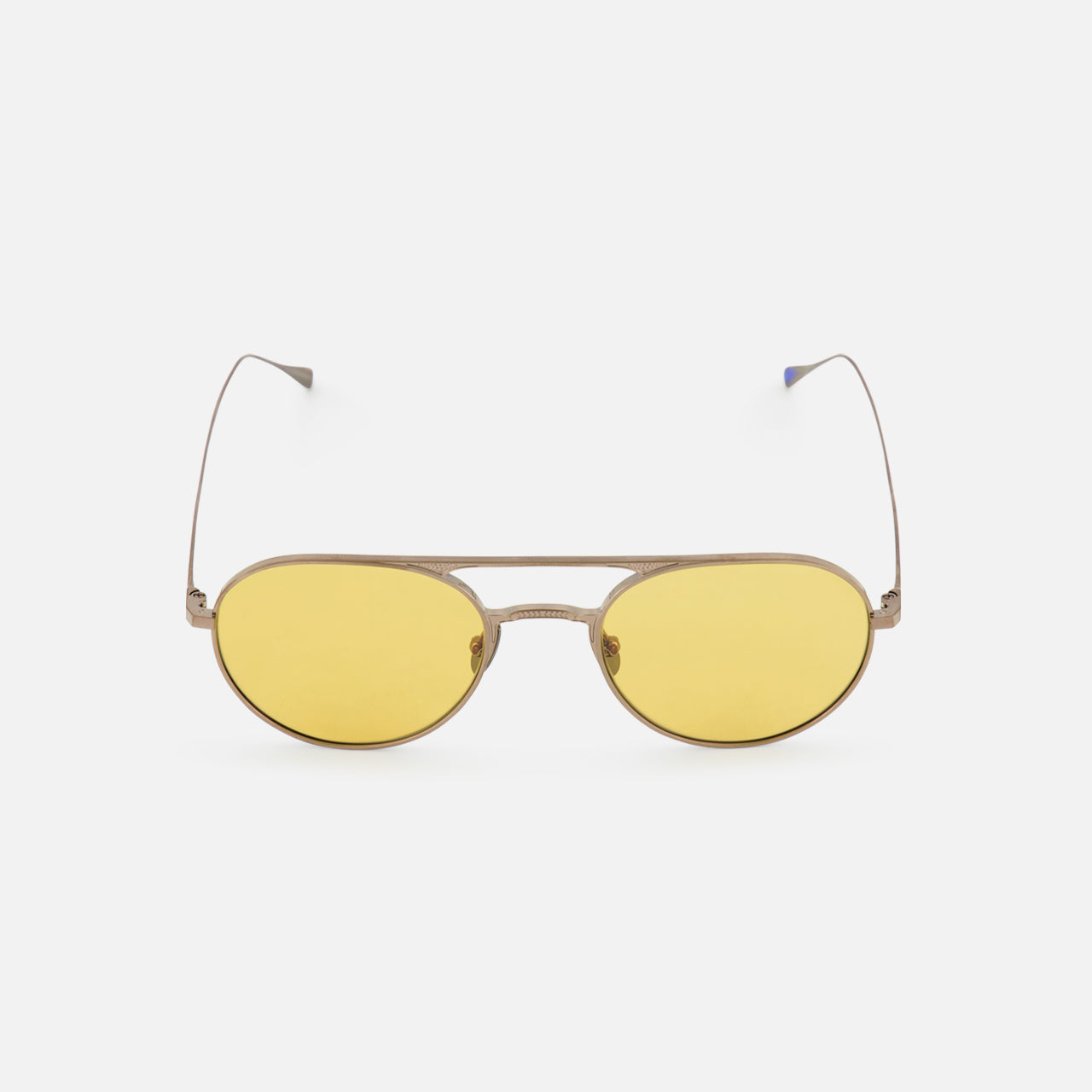 The GARRETT LEIGHT Benny J Round Natural Sunglasses feature thin metallic frames and yellow-tinted lenses, displayed against a plain white background.