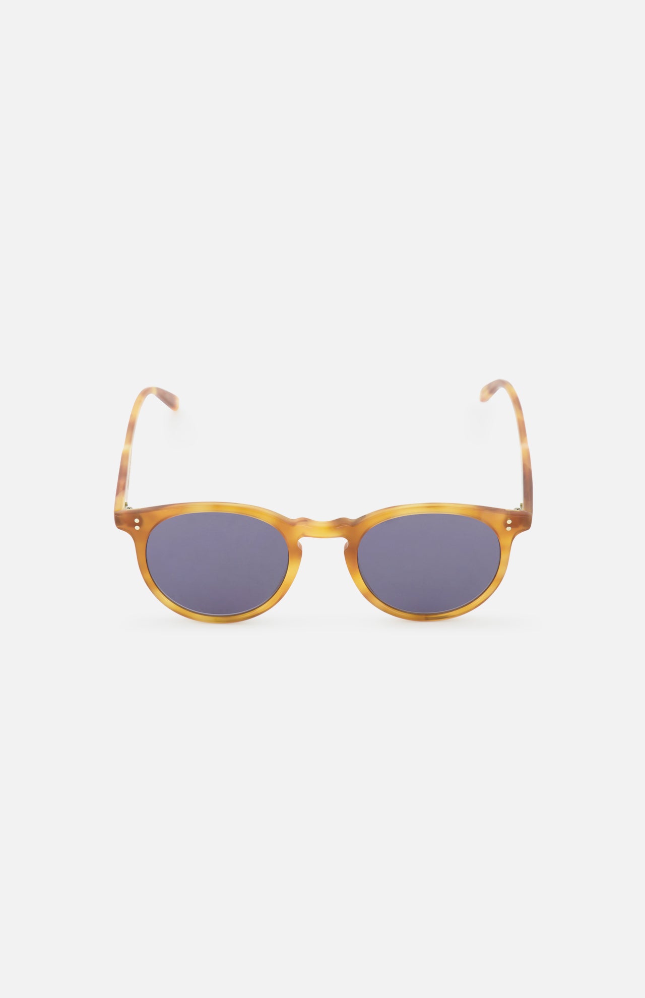 The GARRETT LEIGHT Carlton Round Tan Sunglasses feature amber-hued, bio-based acetate frames and dark lenses, shown against a plain white background.