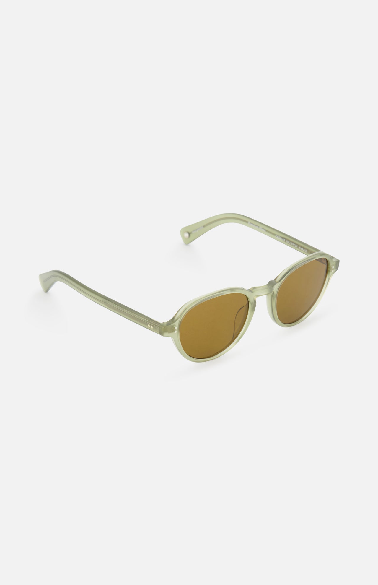 The GARRETT LEIGHT Casillas Round Sea Glass Sunglasses feature light green, semi-transparent oval acetate frames and brown tinted lenses, displayed at an angle on a white background.