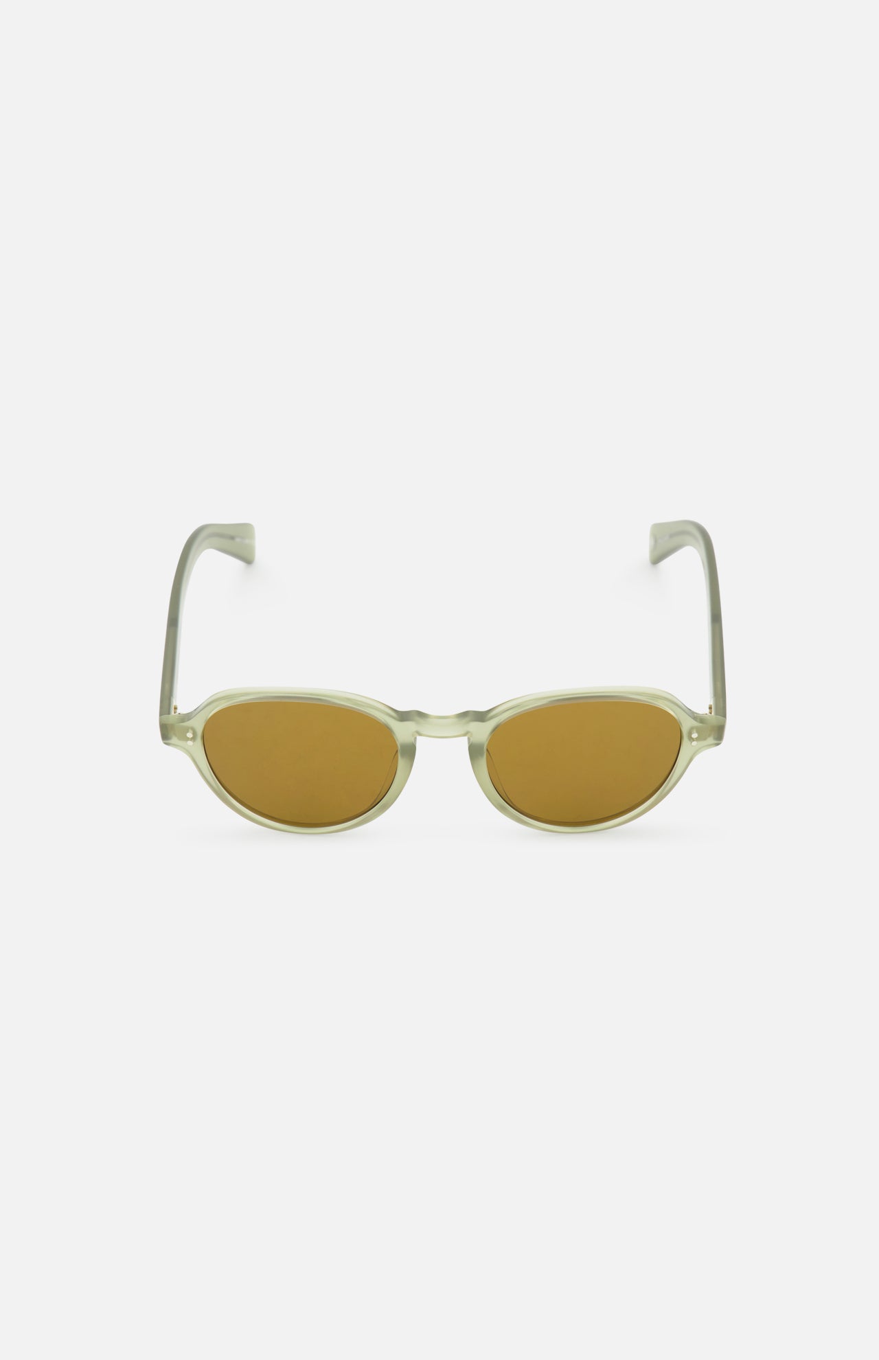 The Casillas Round Sea Glass Sunglasses by GARRETT LEIGHT feature olive green oval lenses, transparent acetate frames, and yellowish-brown tints, shown on a plain white background.