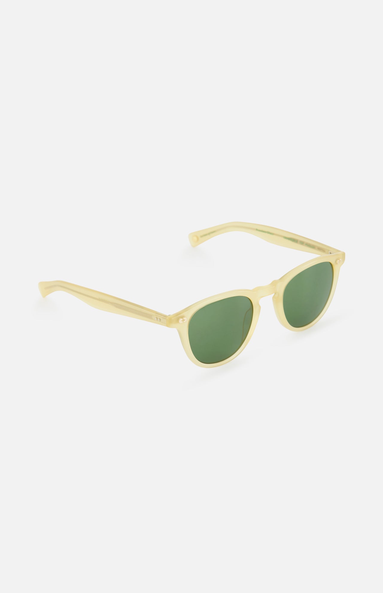 The GARRETT LEIGHT Hampton X Round Neutral Sunglasses feature round acetate frames in light yellow translucent and green tinted lenses, shown against a white background.