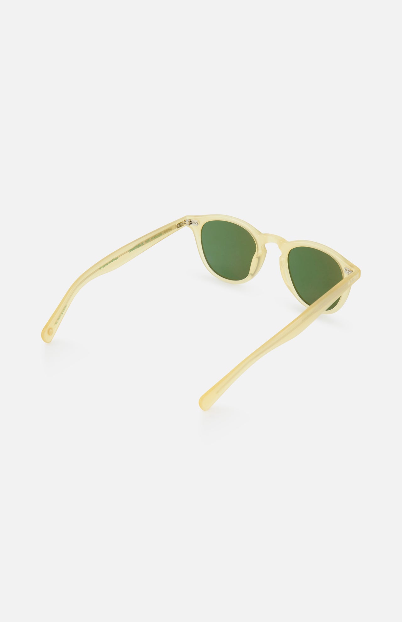 The GARRETT LEIGHT Hampton X Round Neutral Sunglasses feature honey-colored acetate frames and green-tinted lenses, shown with arms extended on a white background.
