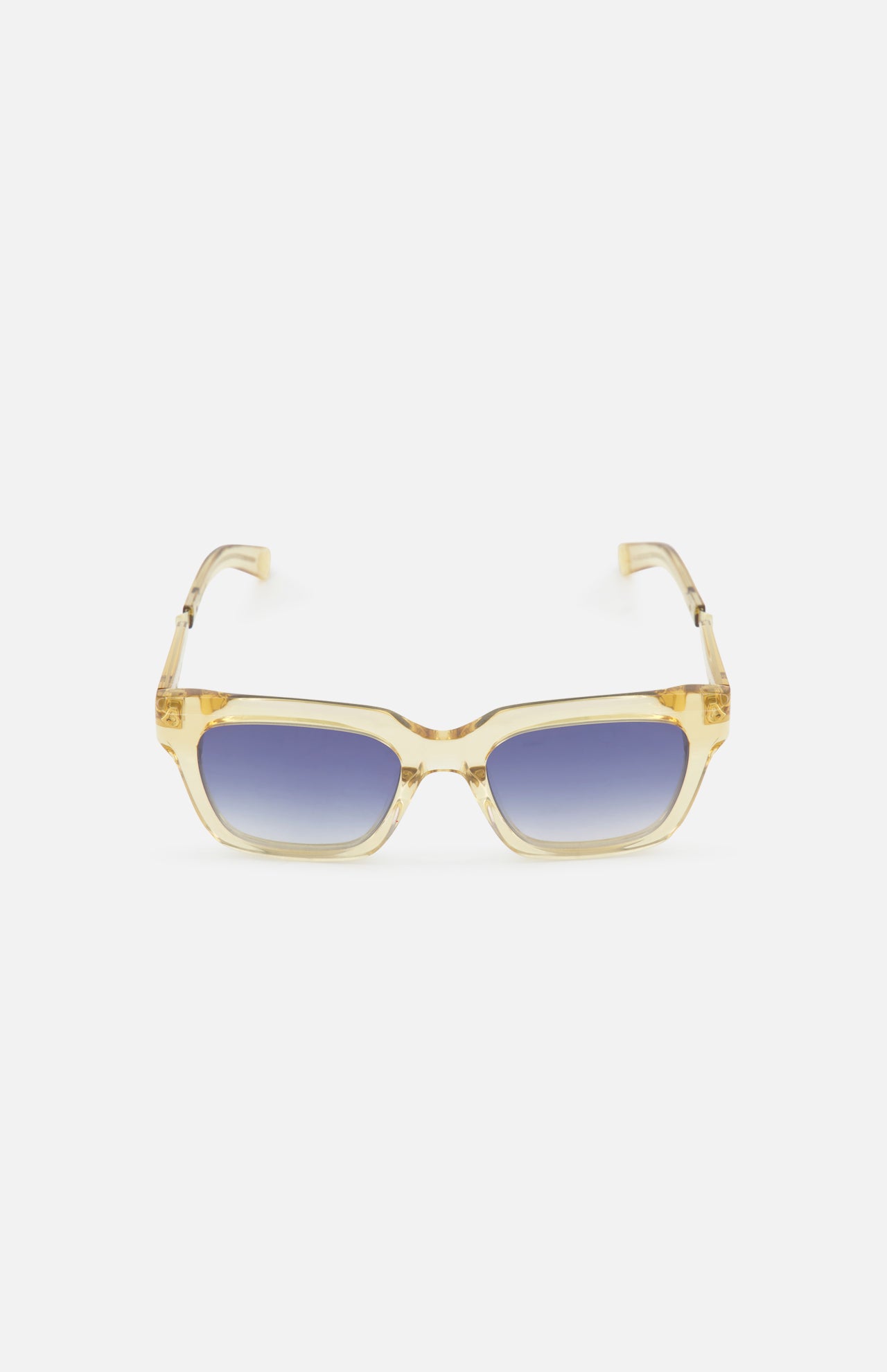 The GARRETT LEIGHT Maven Square Champagne Sunglasses feature translucent yellow frames and bold blue gradient lenses, showcased against a plain white background.