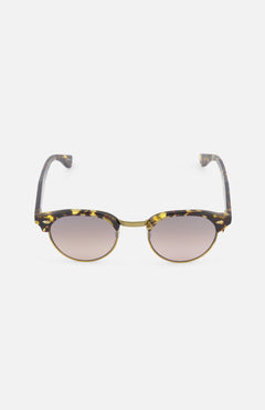 The GARRETT LEIGHT Oakwood Round Tortoiseshell Tan Sunglasses feature contoured temples and gradient brown lenses, shown against a plain white background.