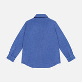 Solid Cashmere Shirt with Malachite Buttons by God’s True Cashmere, displayed from the back in blue, features a classic collar, buttoned cuffs adorned with malachite gemstone snaps, and a slightly curved hem. Shown against a plain white background.