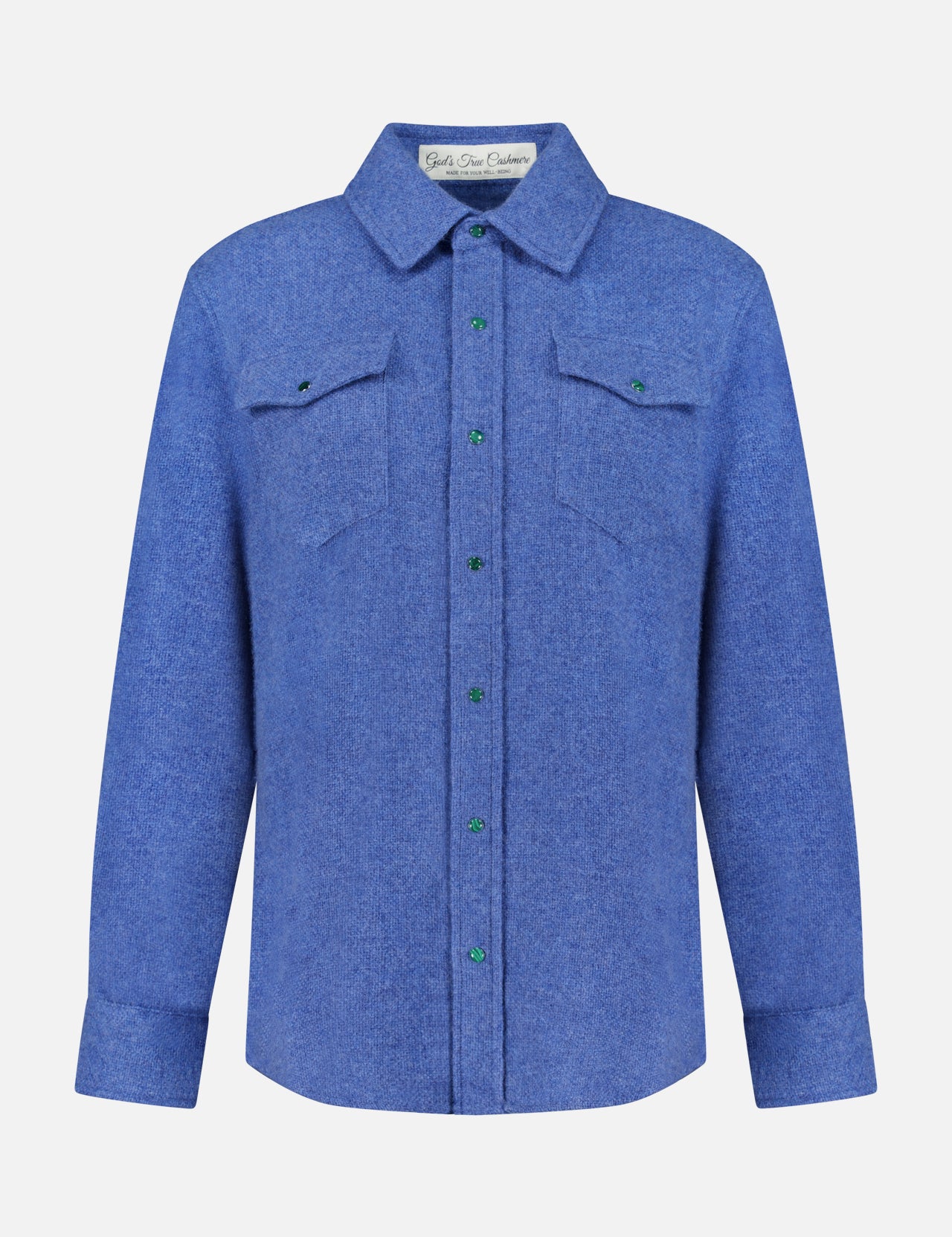 The Solid Cashmere Shirt with Malachite Buttons by God’s True Cashmere is a long-sleeve, button-up unisex blue shirt featuring malachite gemstone buttons, two chest flap pockets, and a collar, displayed on a plain white background.