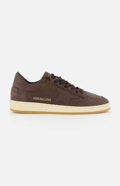 Side view of the BALLSTAR Leather Upper Sneaker by GOLDEN GOOSE in brown leather, featuring a star design, beige scuffed sole, and GGDB/BALLSTAR text on the side, photographed against a plain white background.