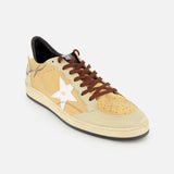 The GOLDEN GOOSE Ballstar Nabuk Upper And Tongue Sneaker is a tan and cream casual shoe with a white star on the side, brown leather laces, and a black sole, shown on a white background.
