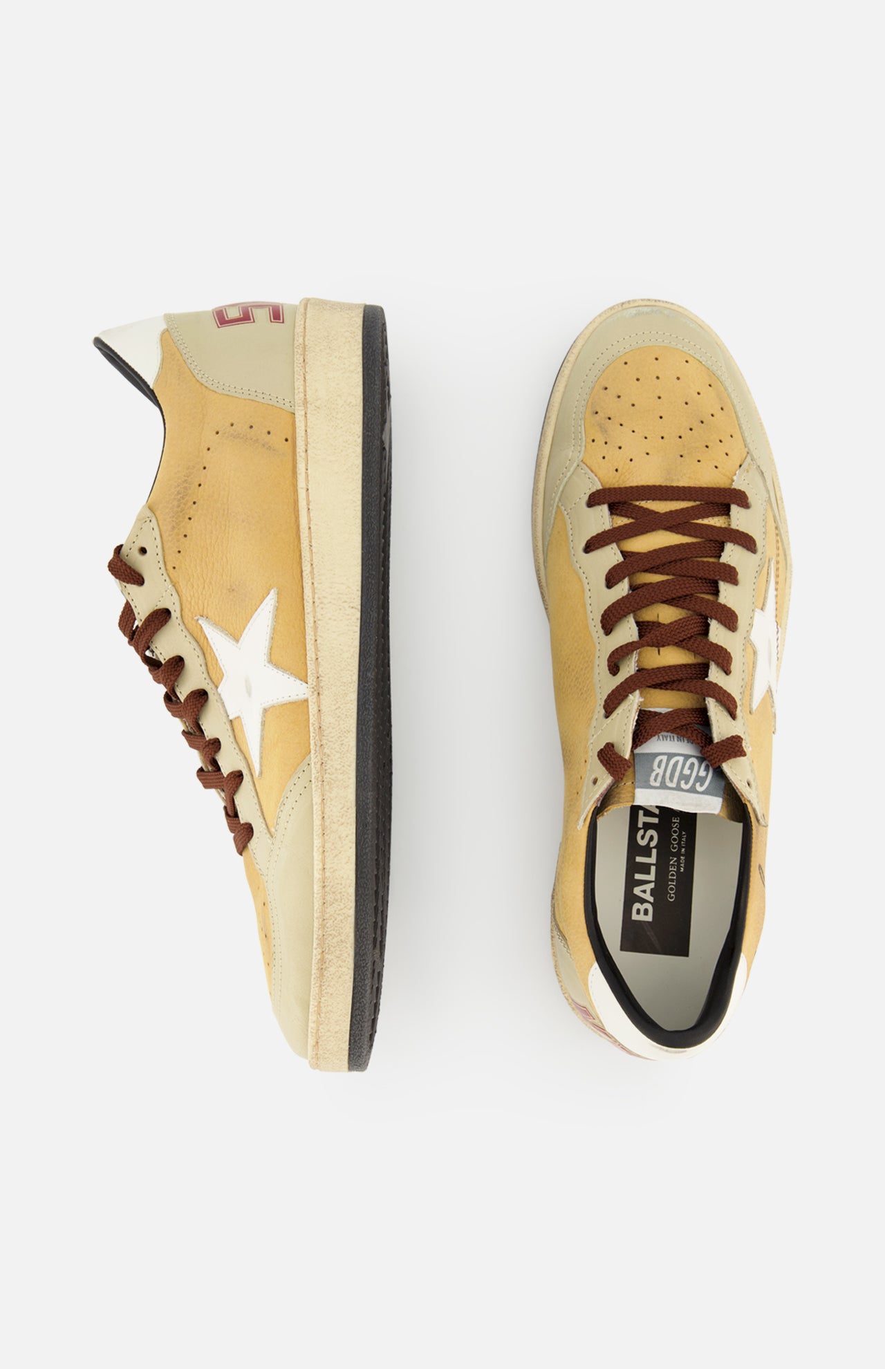 A pair of GOLDEN GOOSE Ballstar Nabuk Upper And Tongue Sneakers in tan suede with white star logos, brown laces, and cream soles are displayed—one shown from the side, the other from above, both on a white background.
