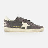 The Ballstar Nabuk Upper Suede Sneaker by GOLDEN GOOSE is a gray men’s low-top with a white star logo, white heel tab, worn-effect sole, and “GGDB/BALLSTAR” in gold near the laces.