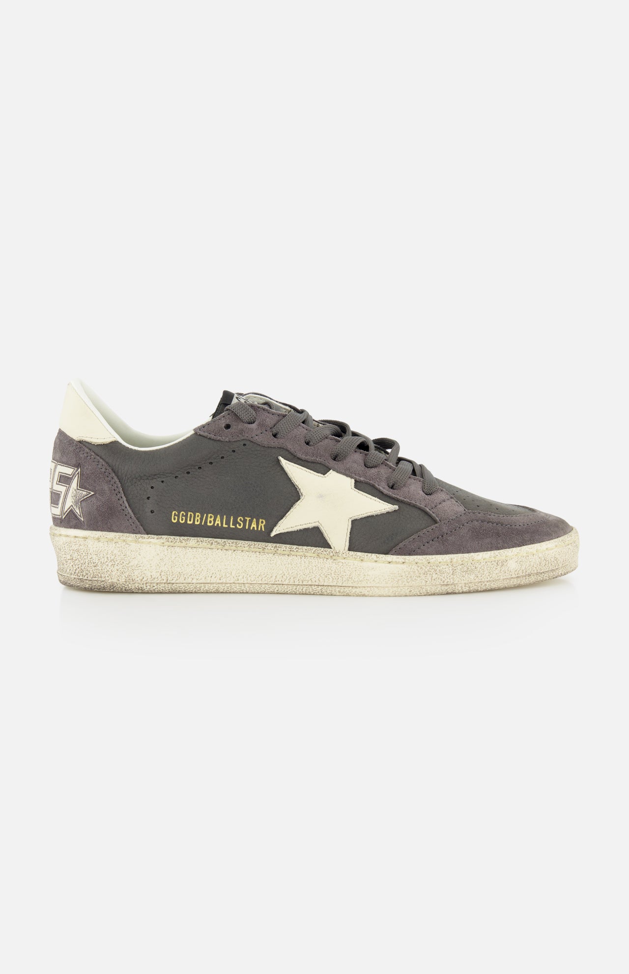 The Ballstar Nabuk Upper Suede Sneaker by GOLDEN GOOSE is a gray men’s low-top with a white star logo, white heel tab, worn-effect sole, and “GGDB/BALLSTAR” in gold near the laces.