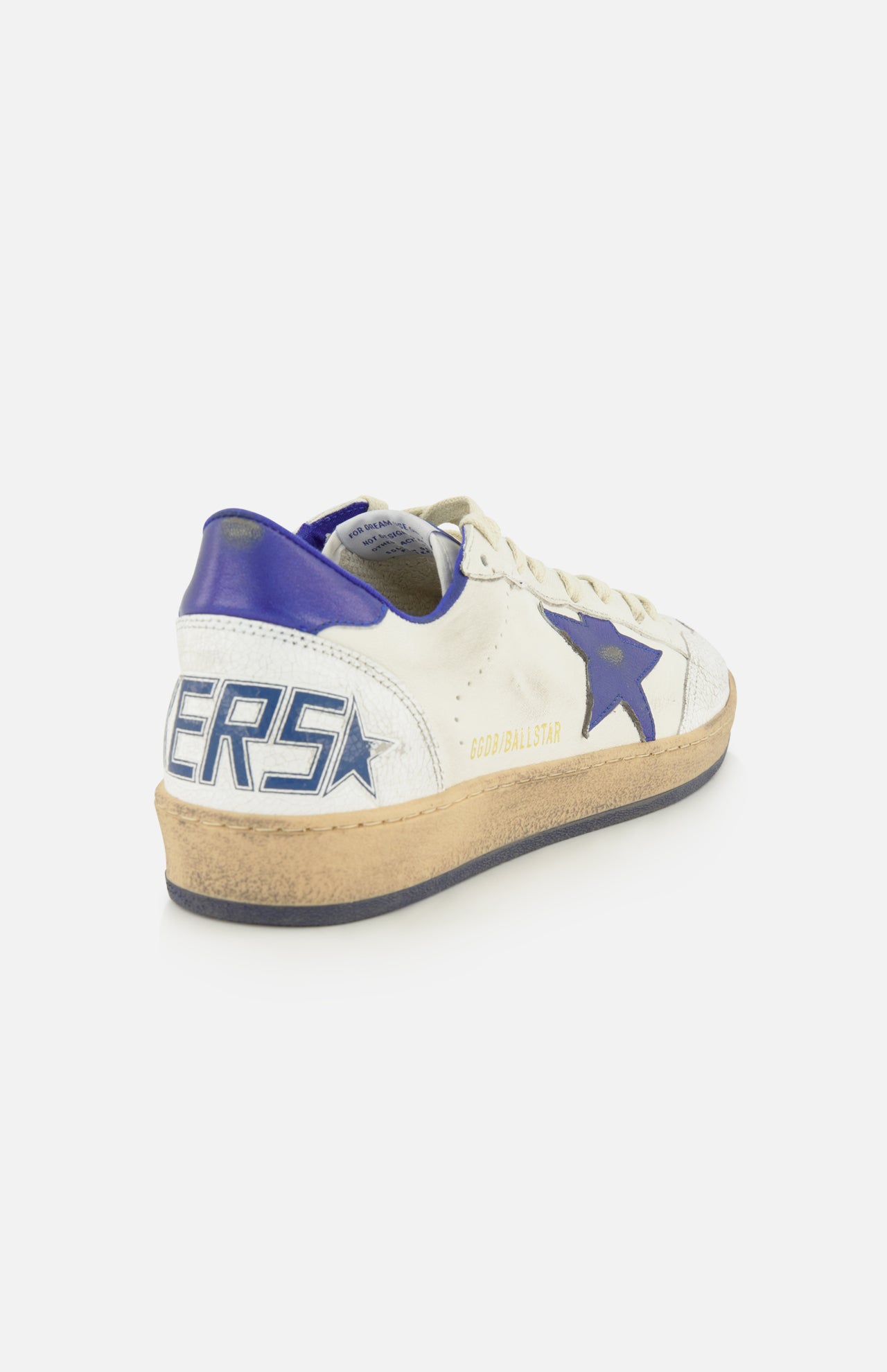 The Ballstar Nappa Upper Sneaker by GOLDEN GOOSE features a white leather upper, accented with a blue star and heel. GOLDEN GOOSE branding appears on the side, while “BALLSTAR” is displayed on the scuffed sole for a worn, vintage effect. The sneaker is photographed against a plain white background.