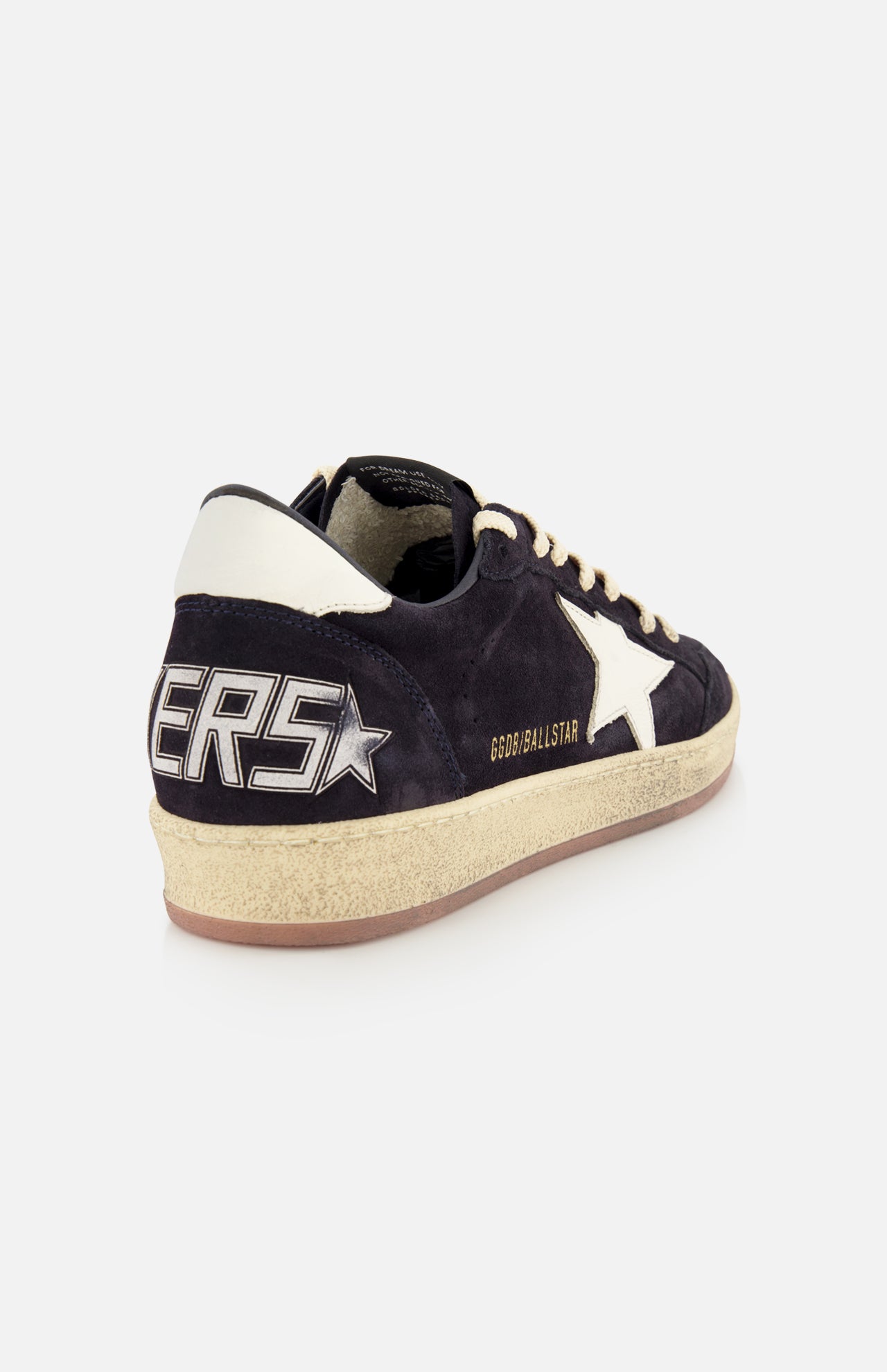 The GOLDEN GOOSE Ballstar Suede Upper Sneaker features a black and navy suede upper, white heel tab, large white star on the side, bold SNEAKERS lettering on the back, and an off-white scuffed sole for a signature worn-in vibe.